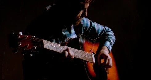 Why Your Guitar Sounds Different at Home and on Stage